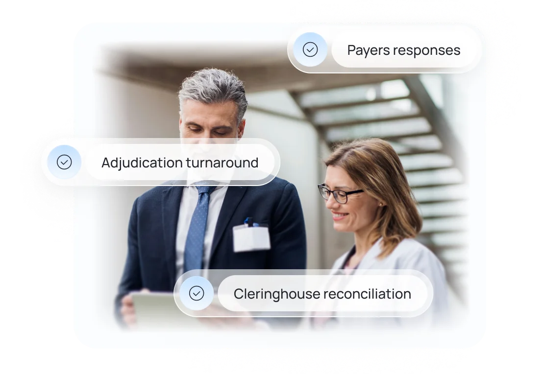 A male professional in a suit and a female healthcare worker with glasses review a tablet together in an office stairwell with overlay text bubbles stating 'Payers responses,' 'Adjudication turnaround,' and 'Clearinghouse reconciliation.'