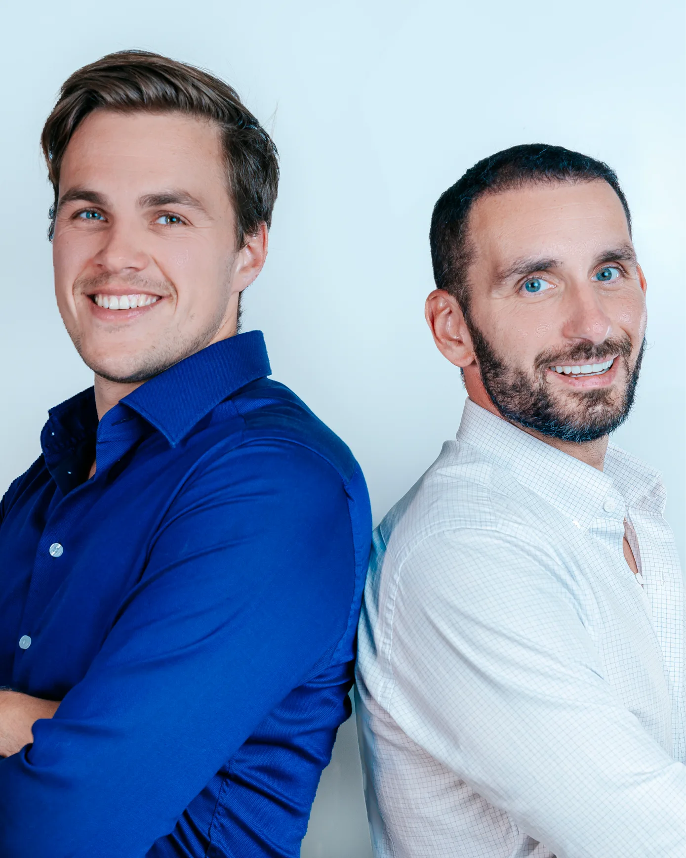 Flobotics co-founders Filip Nasiadko (left) and Karl Mielnicki (right) standing back to back